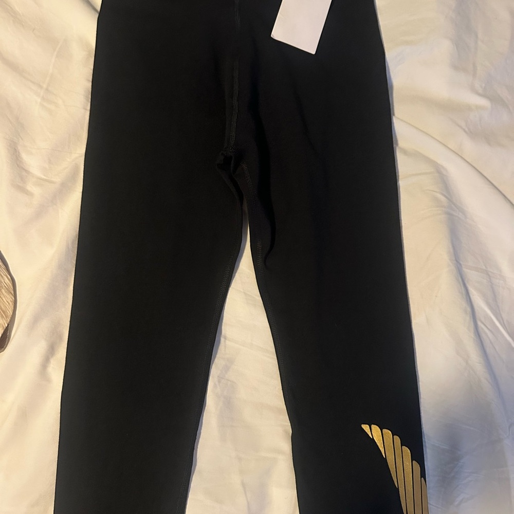 Nike Kids Leggings in Black with Gold Detail
